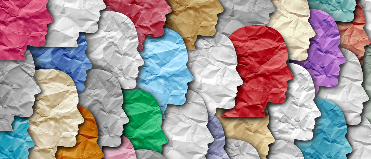 Graphic with human heads overlapping each other. Credit: Lightspring via Shutterstock