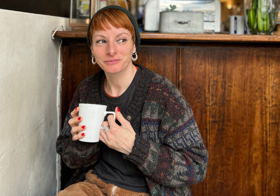 Alice Gambell holding a white cup