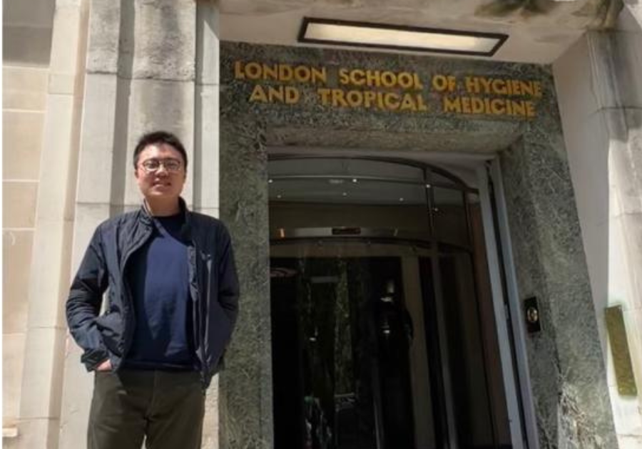Alan Lim standing outside LSHTM Keppel Street building