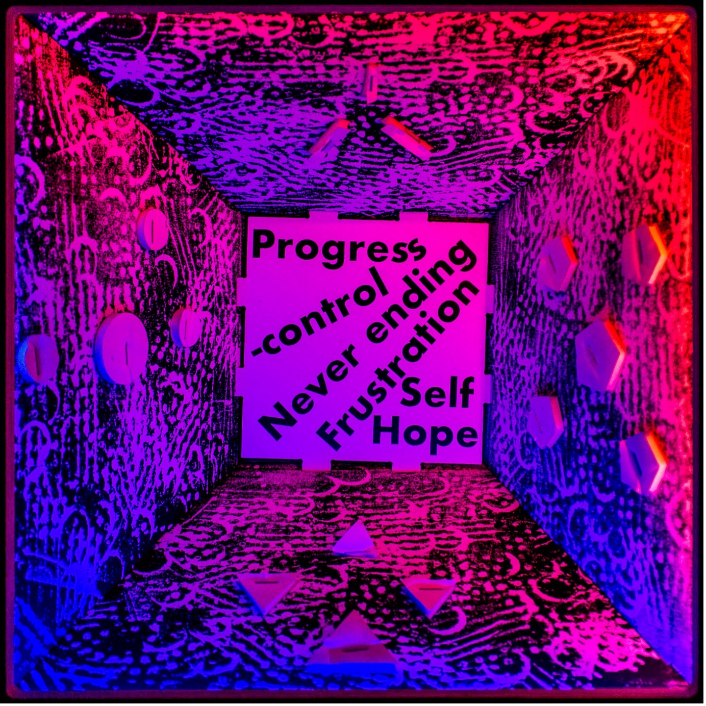 An art project with words including progress, control, never ending, frustration, self, and hope