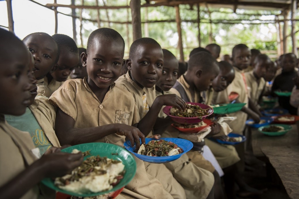 Children eating lunch at a primary school in Burundi. Credit: WFP/Hugh Rutherford Children eating lunch at a primary school in Burundi. Credit: WFP/Hugh Rutherford