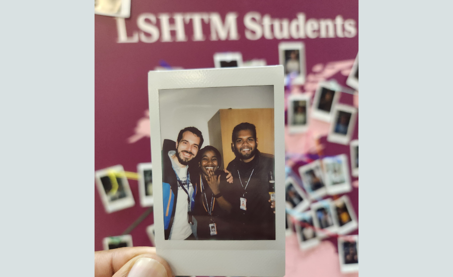 A instant photo of 3 LSHTM students