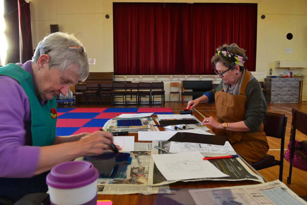 EHR Group cancer workshop two people painting