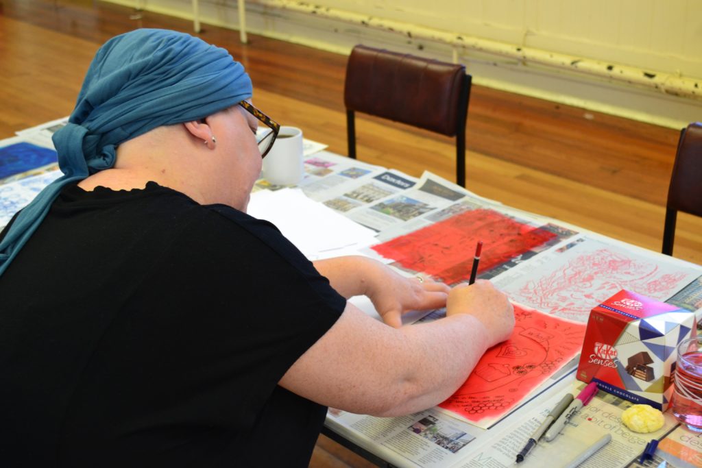EHR Group cancer workshop woman drawing