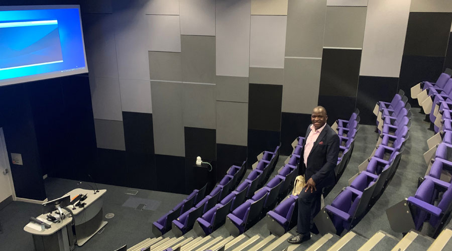 Enock Musungwini in the LSHTM Lecture Theatre