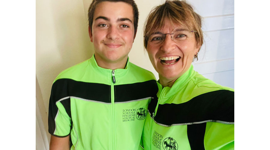Areille and Alex try on their cycle jerseys