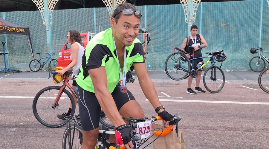 Phil arrives in Brighton with a smile on his face