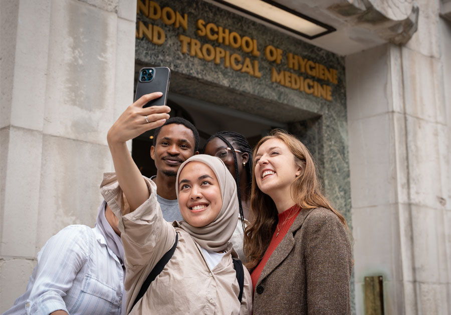 MSc students taking photos outside Keppel Street