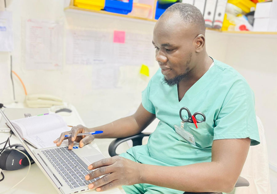 Reuben studying Tropical Diseases in a microbiology lab.