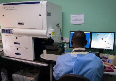 A scientist working in a TB Lab