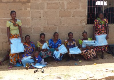 Women with mosquito nets, Busolwa, Tanzania. 
