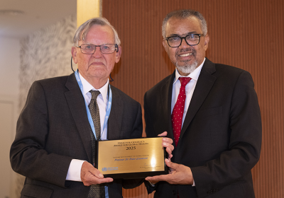 Brian Greenwood presented with Lifetime Achievement Award by WHO. Credit: WHO.