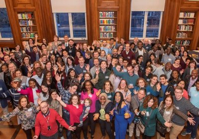 Large group of people at reception in the school Library
