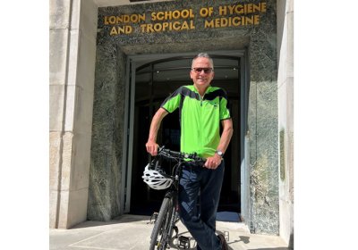 Liam Smeeth with bike outside LSHTM entrance