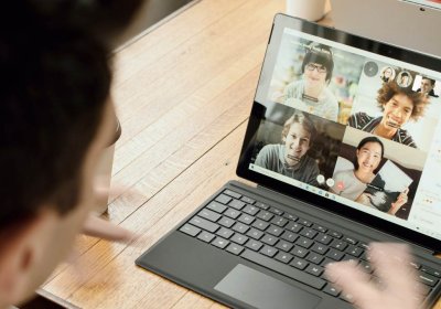 Man video chatting on his laptop