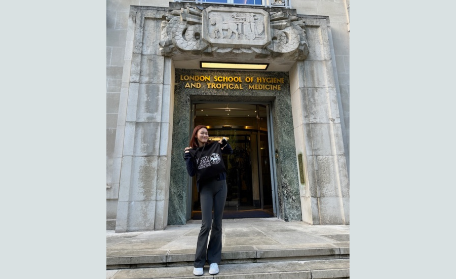 Whitney Chan. Whitney Chan standing outside LSHTM Keppel Street Entrance
