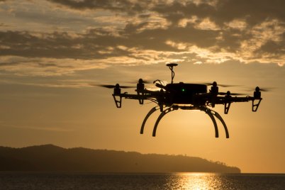 A thermal camera drone hovers against the setting sun in the UMS campus in Malaysia - Joshua Paul for LSHTM