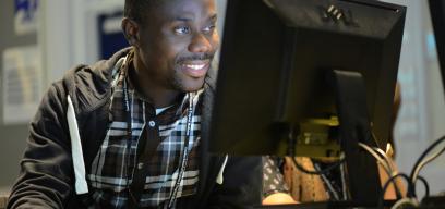 student on computer