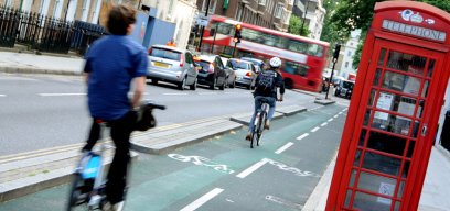 cyclist on a busy road