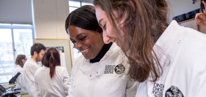 Two female students in a lab