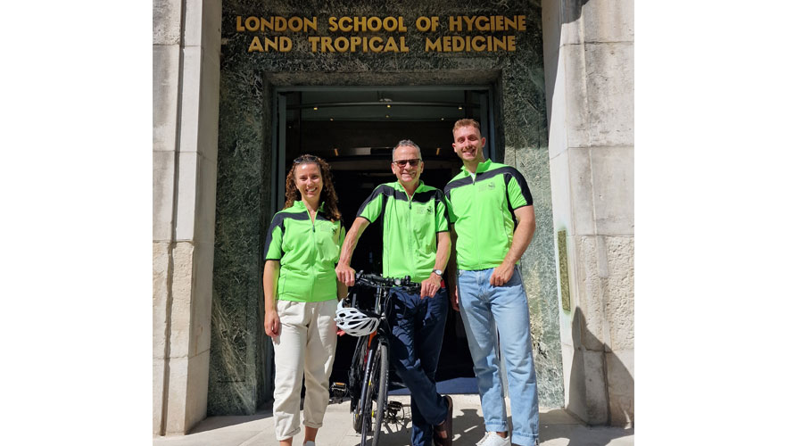 Liam Smeeth, with alumni Zoe and Jake with bike